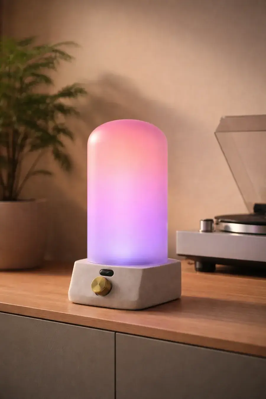 Synthalia: la lampada strumento sotto una cloche di vetro che si illumina di rosa e viola